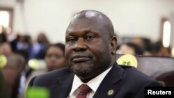 FILE - South Sudan's First Vice President Riek Machar attends his swearing-in ceremony at the State House in Juba, South Sudan, Feb. 22, 2020.
