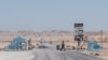 FILE - A checkpoint in the desert of the Somali region of Puntland leads to the port city of Bossaso, March 25, 2018. Authorities in Puntland announced this week measures to disrupt Islamic State financial networks in Somalia.