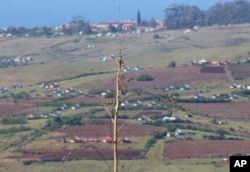 Zithulele Hospital looms in the distance in Oliver Tambo District, South Africa … Ndabazonke must walk very far over rough terrain, on crutches, to see her therapist at the facility