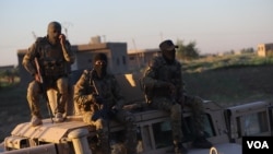 Kombatan Pasukan Demokratik Suriah (SDF) di Provinsi Deir al-Zour, 18 Juli 2020. (Foto: VOA)