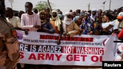 FILE - Nigeriens demonstrate to protest against the U.S. military presence, in Agadez, Niger, April 21, 2024.