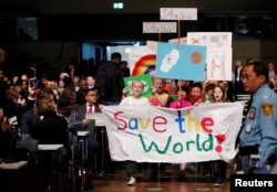 Children participate during climate march before the opening session of the COP23 U.N. Climate Change Conference 2017, hosted by Fiji but held in Bonn, in World Conference Center, Bonn, Germany, Nov. 6, 2017.
