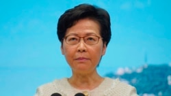 Hong Kong Chief Executive Carrie Lam listens to reporters' questions during a press conference in Hong Kong, Tuesday, July 7, 2020. TikTok says it will stop operations in Hong Kong, joining other social media companies.