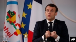French President Emmanuel Macron delivers his speech after a meeting via video-conference with leaders of the G5 Sahel, Feb. 16, 2021 in Paris.