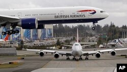 A British Airways jet flies overhead on landing in Everett, Washington. (file photo)