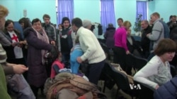 Fearful Ukrainian Refugees Try to Get on With Life