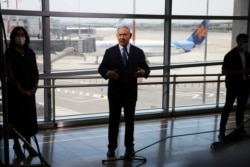 Israeli Prime Minister Benjamin Netanyahu prepares to give a statement at Ben Gurion International Airport, in Lod, near Tel Aviv.