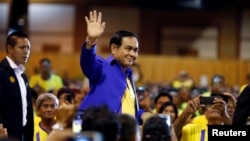 Thailand's Prime Minister Prayut Chan-o-cha arrives to deliver a keynote speech at the opening ceremony of "National Fund to Reduce Inequalities" ahead of the general election, in Bangkok, Thailand, March 18, 2019.