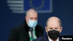 German Chancellor Olaf Scholz attends an EU Summit at the European Council building in Brussels, Belgium, Dec. 16, 2021.