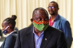 FILE - South African President Cyril Ramaphosa visits the coronavirus disease (COVID-19) treatment facilities in Johannesburg,