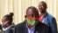 FILE PHOTO: South African President Cyril Ramaphosa visits the coronavirus disease (COVID-19) treatment facilities in Johannesburg