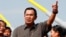 FILE - Cambodian Prime Minister Hun Sen, shown delivering a speech in Phnom Penh in January, calls Sam Rainsy, head of the opposition Cambodia National Rescue Party, a “traitor’s son.”