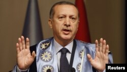 Turkish Prime Minister Tayyip Erdogan addresses an audience at Yildiz Technical University in Istanbul, October 5, 2012.