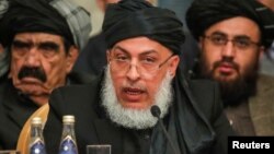 Head of Political Office of the Taliban Sher Mohammad Abbas Stanakzai speaks at a conference arranged by the Afghan diaspora, in Moscow, Russia Feb. 5, 2019. 