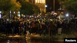 Demonstrators rally at a protest against the ruling elite they accused of steering Lebanon towards the current economic crisis, in Beirut, Lebanon, Jan. 19, 2020.