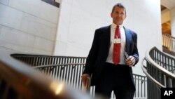 FILE - In this Nov. 30, 2017 file photo, Blackwater founder Erik Prince arrives for a closed meeting with members of the House Intelligence Committee on Capitol Hill in Washington.