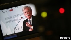 Mantan penasihat keamanan nasional AS, John Bolton, tampak dalam layar kamera video saat dia memberikan kata pengantar dalam diskusi di Center for Strategic and International Studies (CSIS) di Washington, 30 September 2019.