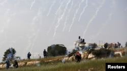 The midnight fireworks are seen during New Year's Eve celebrations in Sydney, Australia.