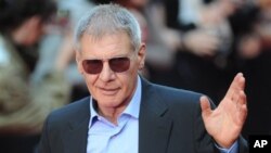 Iranian Shi&#39;ite Muslims mourn after covering themselves with mud during Ashoura rituals, in Khorramabad. Shi&#39;ites mark Ashoura, the tenth day of the Muslim month of Muharram, to commemorate the martyrdom of Imam Hussein, a grandson of Prophet Muhammad and one of Shiite Islam&#39;s most beloved saints, during the 7th century Battle of Karbala in present-day Iraq.