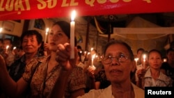FILE - Anti-corruption activist in Hanoi.