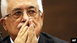 Palestinian President Mahmoud Abbas listens to a question during a news conference in the capital Sarajevo, Bosnia-Herzegovina, August 16, 2011