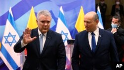 رئیس جمهوری کلمبیا (چپ) در کنار نخست وزیر اسرائیل