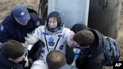 Police officers fire a tear gas during a demonstration against a proposed extradition bill in Hong Kong, China.