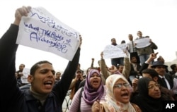 FILE - Jobless archeology graduates protest in demand of jobs in the Egyptian museum, in Cairo, Egypt, Feb 16, 2011.