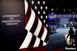 Students playing the roles of the candidates go through a rehearsal for the second 2016 U.S. presidential debate at Washington University in St. Louis, Missouri, Oct. 8, 2016.
