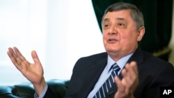 FILE - Russian envoy to Afghanistan Zamir Kabulov speaks during an interview with The Associated Press in Moscow, Feb. 13, 2019.