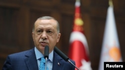Le président turc Tayyip Erdogan lors d'une réunion au parlement à Ankara, en Turquie, le 24 juillet 2018.
