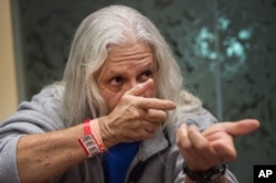 Planned Parenthood clinic shooting survivor Ozy Licano describes his encounter with the shooter Friday, Nov. 27, 2015, in Colorado Springs Colo.