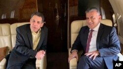 This photo released on the official twitter page of the Lebanese General Security Directorate, shows Maj. Gen. Abbas Ibrahim, right, chief of Lebanese General Security Directorate, and Nizar Zakka, left, a Lebanese citizen and permanent U.S…