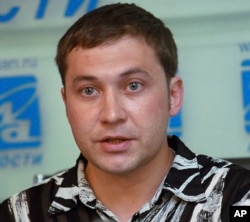 FILE - Russian Airat Vakhitov, a former Guantanamo detainee, speaks at a news conference in Moscow, June 28, 2005.