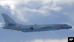 A Chinese People's Liberation Army H-6 bomber is seen flying near the Taiwan air defense identification zone, ADIZ, near Taiwan, Sept. 18, 2020, in this photo released by the Taiwan Ministry of National Defense.