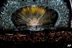 Host Jimmy Kimmel speaks at the Oscars, March 4, 2018, at the Dolby Theatre in Los Angeles.