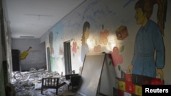 Debris strewn throughout destroyed school at Al Khalidieh, near Homs, September 25, 2012.