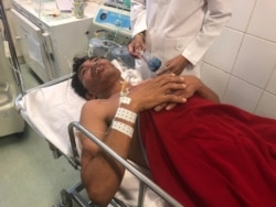 Ros Sitha, 40, a worker, survived being trapped in the rubble of a collapsed building in Sihanoukville for more than 2½ days, June 24, 2019 (Sun Narin/VOA Khmer)