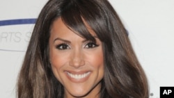 FILE - Model Leeann Tweeden attends the "Sports Spectacular" in Los Angeles, California.