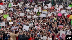 The crowd cheers during a teacher rally at the state Capitol in Oklahoma City, Monday, April 2, 2018. (AP Photo/Sue Ogrocki)