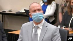 FILE - In this image taken from video, former Minneapolis police Officer Derek Chauvin listens as Hennepin County Judge Peter Cahill sentences him to 22 1/2 years in prison, June 25, 2021.