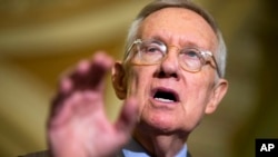 FILE - Senate Minority Leader Harry Reid of Nevada says the legislation on sanctuary cities "paints all immigrants as criminals."