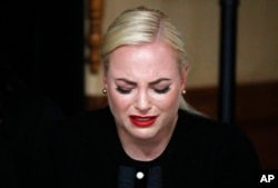 FILE - Meghan McCain, daughter of, Sen. John McCain, R-Ariz. cries during a memorial service at the Arizona Capitol on Wednesday, Aug. 29, 2018, in Phoenix.