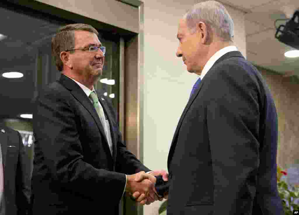 U.S. Defense Secretary Ash Carter (left) is greeted by Israeli Prime Minister Benjamin Netanyahu as he arrives at the prime minister&amp;#39;s office in Jerusalem, July 21, 2015.