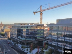 Immigrant investors seeking U.S. visas financed the construction of this office and retail complex called "Home Plate Center" across from Seattle's baseball stadium. (Photo by Tom Banse for VOA)