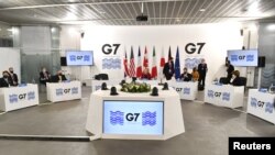 British Foreign Secretary Liz Truss speaks during a G-7 foreign and development ministers session with guest countries and ASEAN nations in Liverpool, Britain, Dec, 12, 2021. 