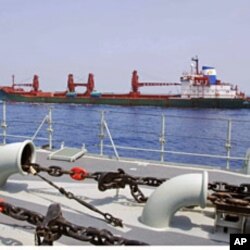 A view of the United Nations World Food Program (WFP) ship, MV Fidel (in the background) in the high seas of the Indian Ocean, off the Somalia coastline (2009 file photo)