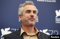 Mexican film director Alfonso Cuaron, a member of the jury at the 72nd Venice Film Festival, poses during a photo call for the event in Venice, Italy, Sept. 2, 2015.