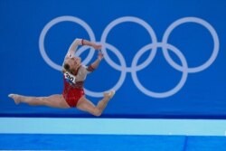 Angelina Melnikova of Russia performs her floor exercise during the women's artistic gymnastic qualifications at the 2020 Summer Olympics, July 25, 2021, in Tokyo.