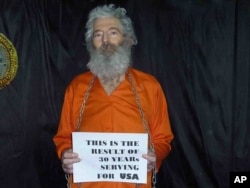 FILE - This undated handout photo provided by the family of Robert Levinson, shows retired-FBI agent Robert Levinson. Levinson, 64, went missing on the Iranian island of Kish in March 2007.